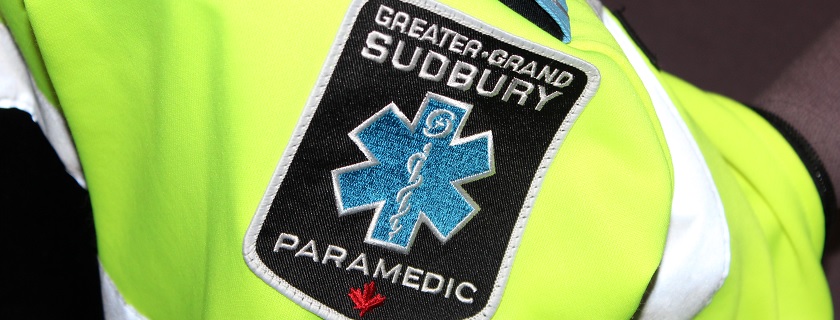 A paramedic jacket sleeve with Greater/Grand Sudbury Paramedic badge on it.