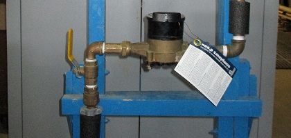 Insulated pipes near water meter.